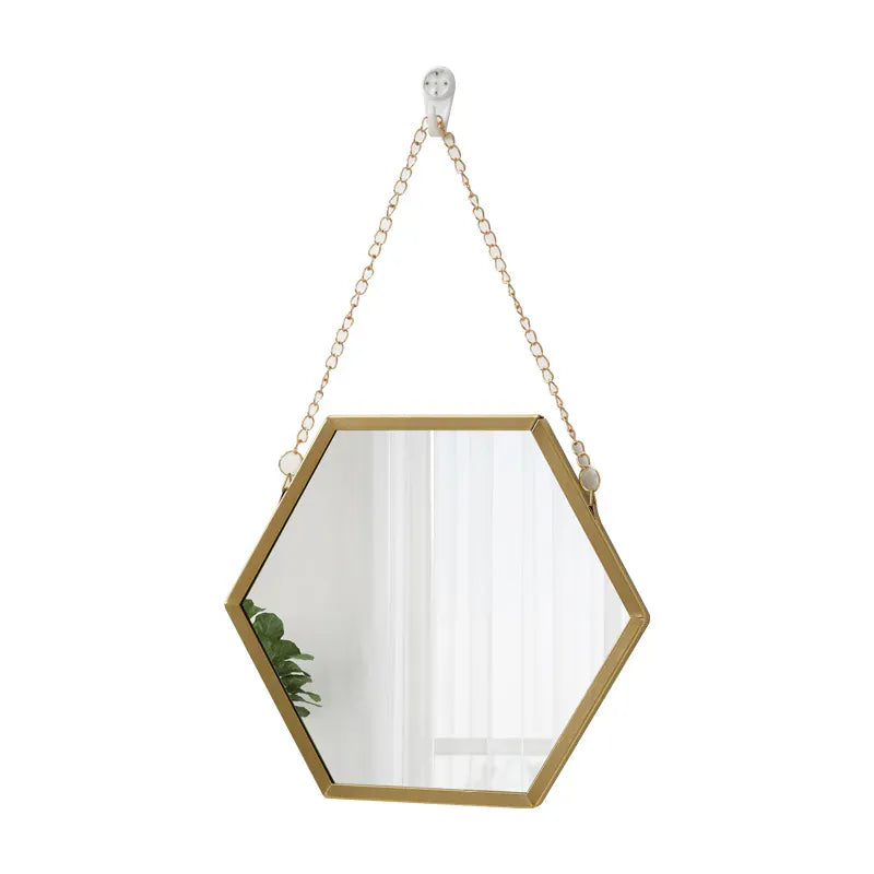miroir doré hexagonal