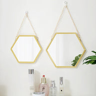 miroir hexagonal doré